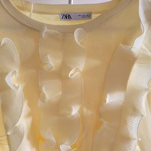 Zara light yellow knit blouse with ruffles